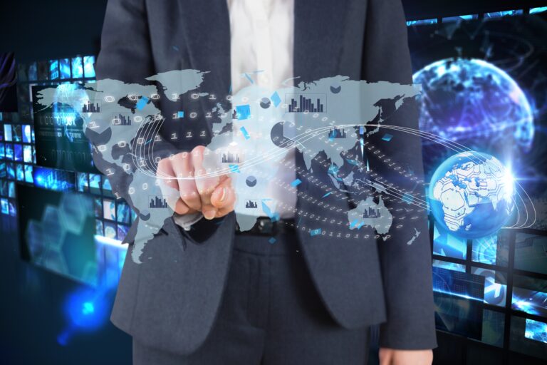 composite of businessman pointing at graphics